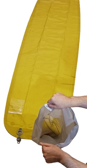 Learn about Sleeping Pads for Backpacking Sleeping-pad Pump Sack Being Filled with Air