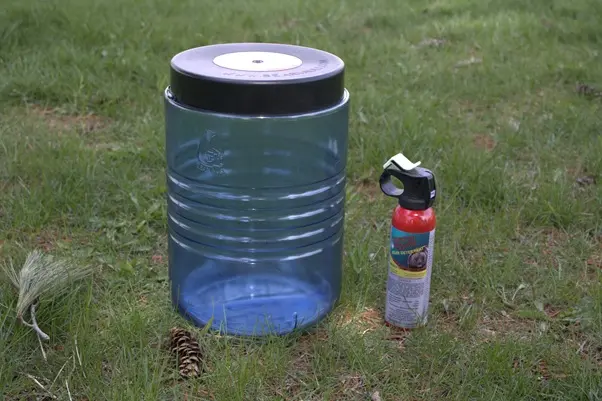 Bear canister and bear spray